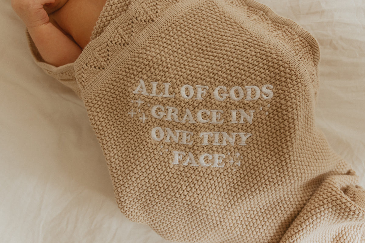 All of Gods Grace in One Tiny Face Tan Knit Blanket