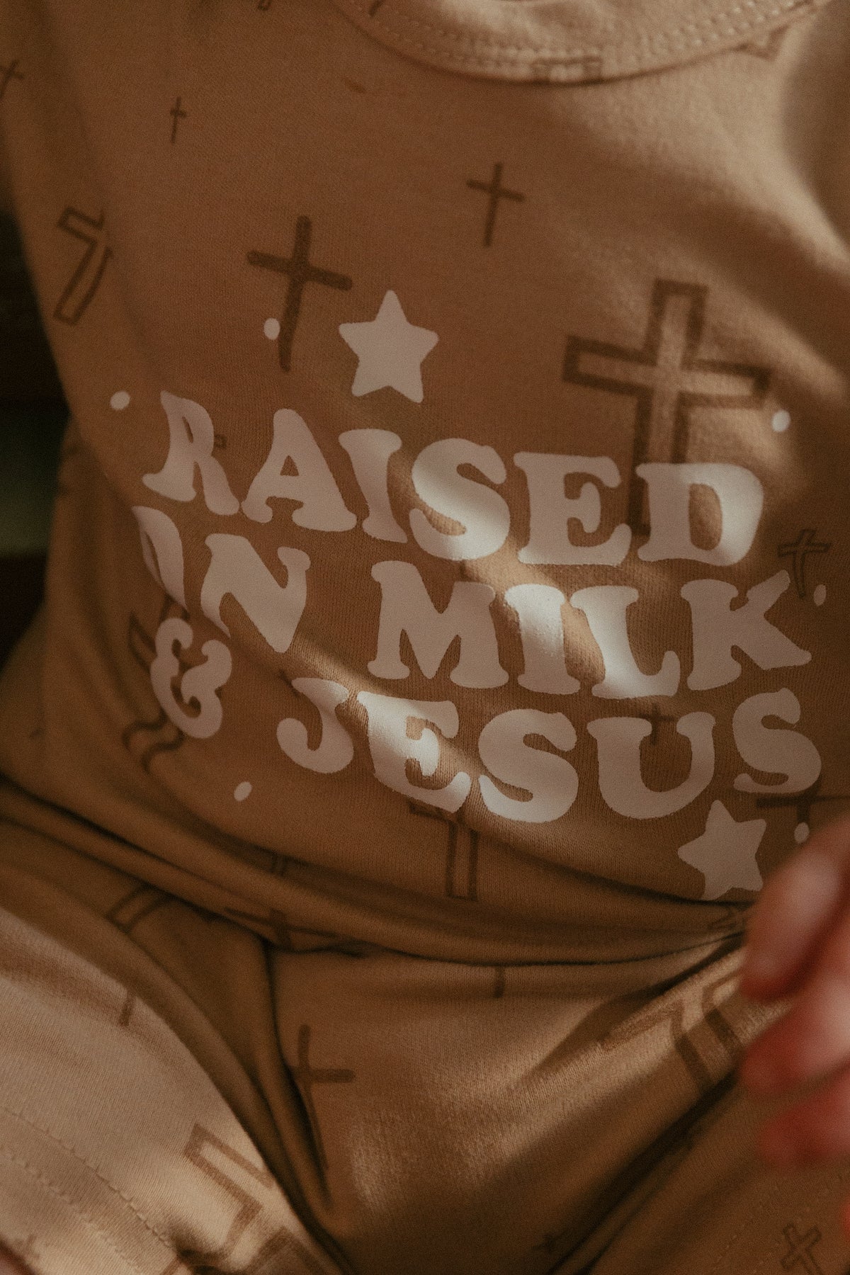 Raised on Milk & Jesus Cross Jumpsuit
