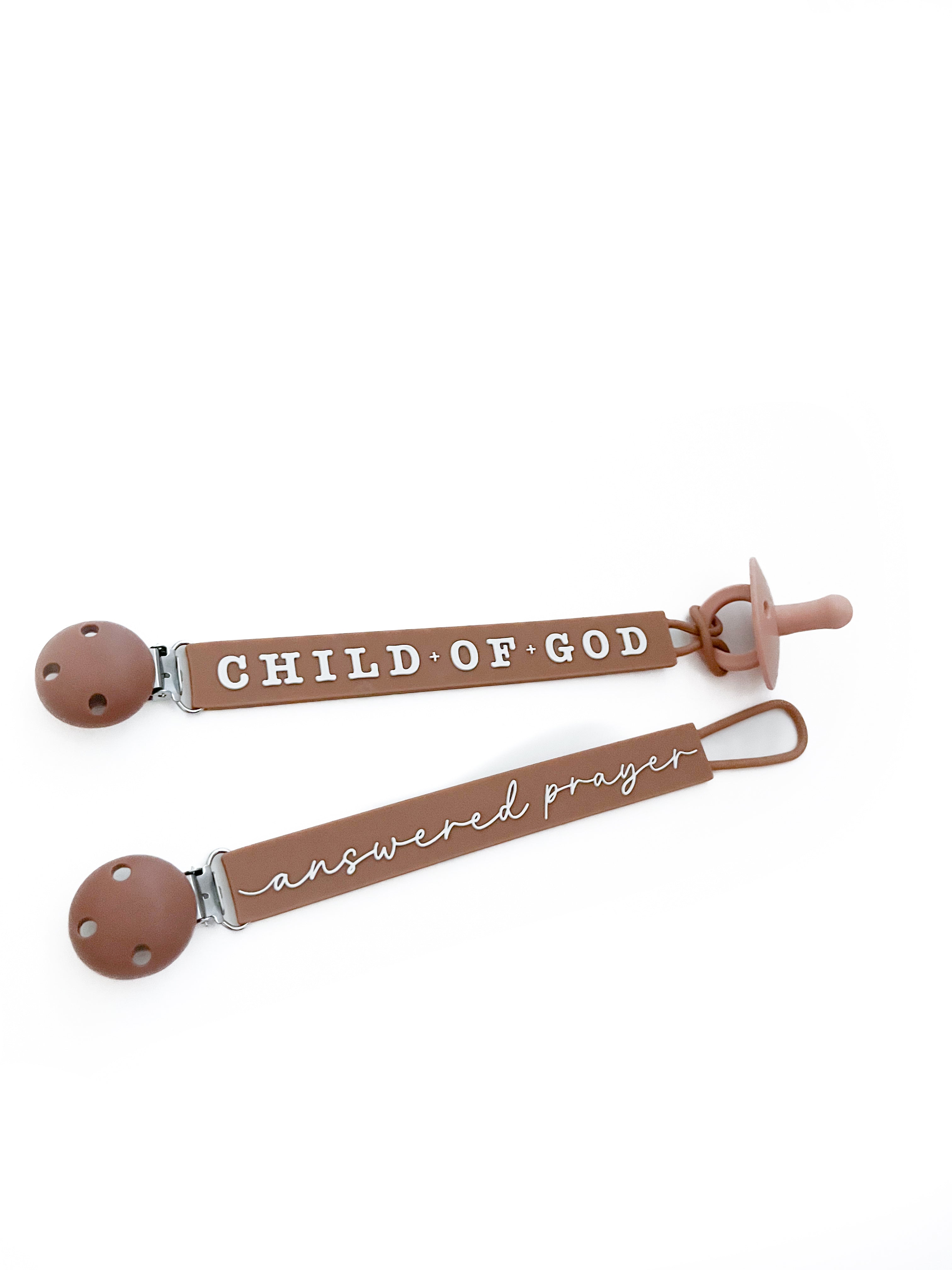 Silicone pacifier clip